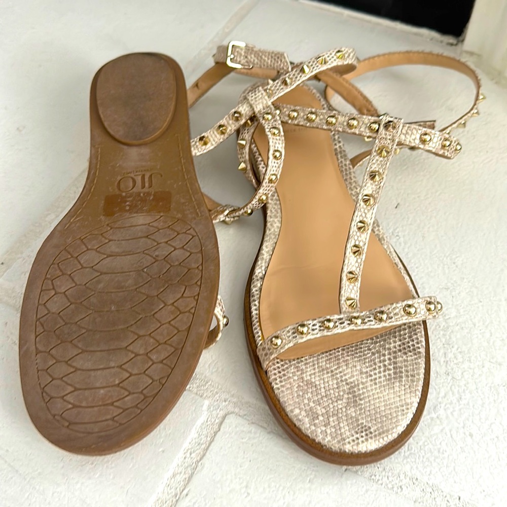 Jennifer Lopez sandals. Lightly used. Very cute and comfy. Small wedge heel.